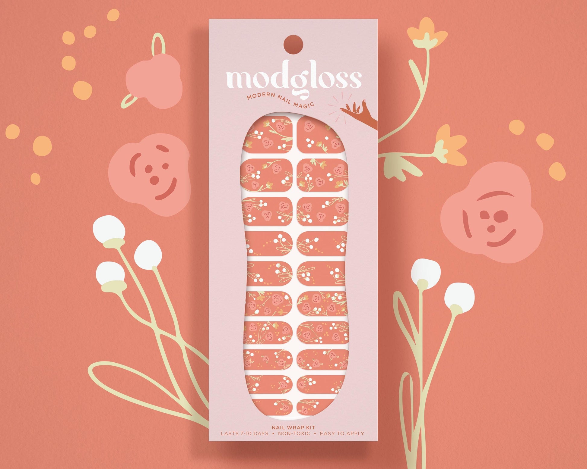 a package of nail polish sitting on top of a pink background